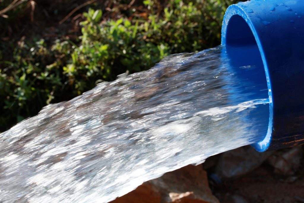 clean water coming out of large pipe